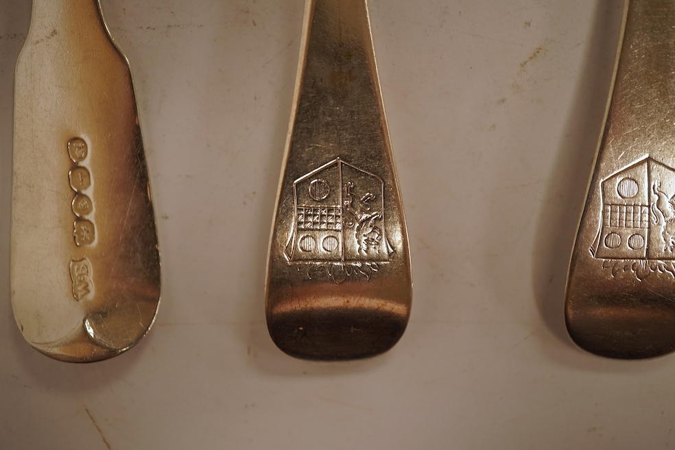 A set of five George I silver Hanoverian rat-tail pattern table spoons by Samuel Hitchcock, London, 1725 and four George IV silver fiddle pattern table forks, with engraved initial and crest, William Bateman, London, 182